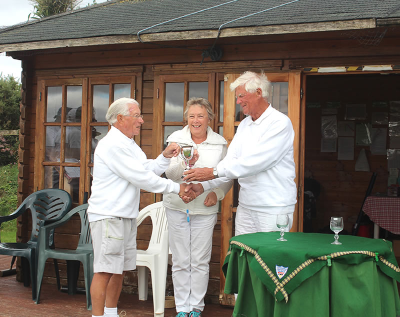 Ron George (right) presents The Cup to the Winners, Russell Moore & Dorianne Forsdick